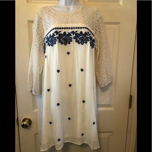 Entro dress size large.  Off white.  Dress is lined.